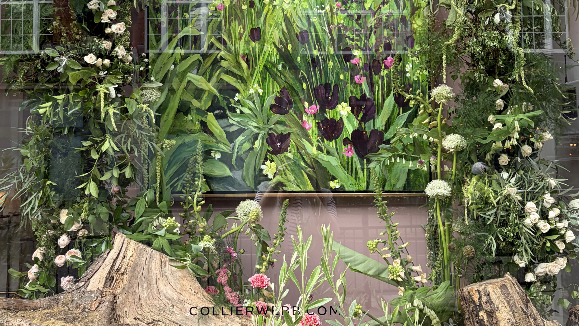 A window display for Belgravia in Bloom featuring a floral installation by Sussex florist Scene Floral Design