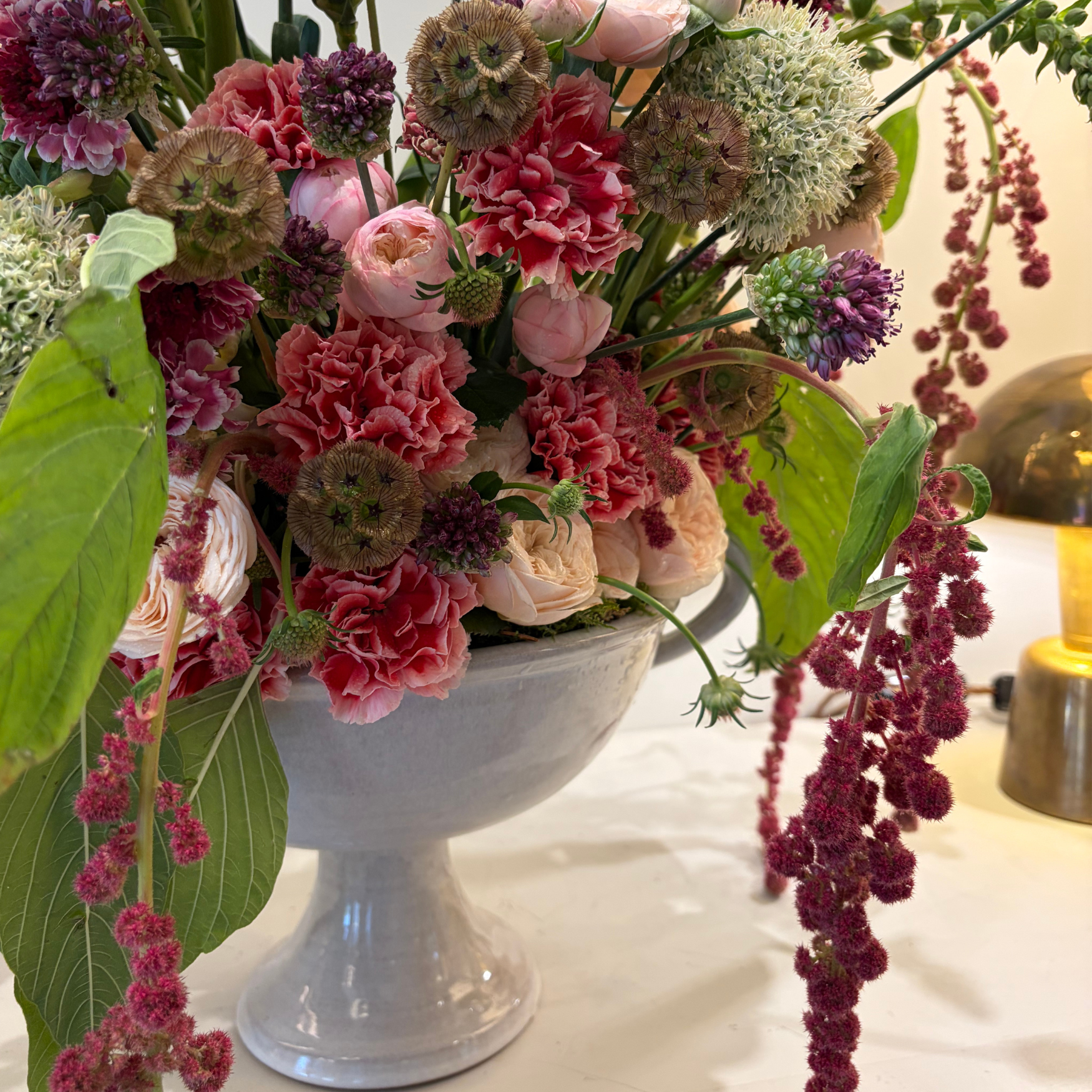 a vibrant modern display of flowers in a London showroom
