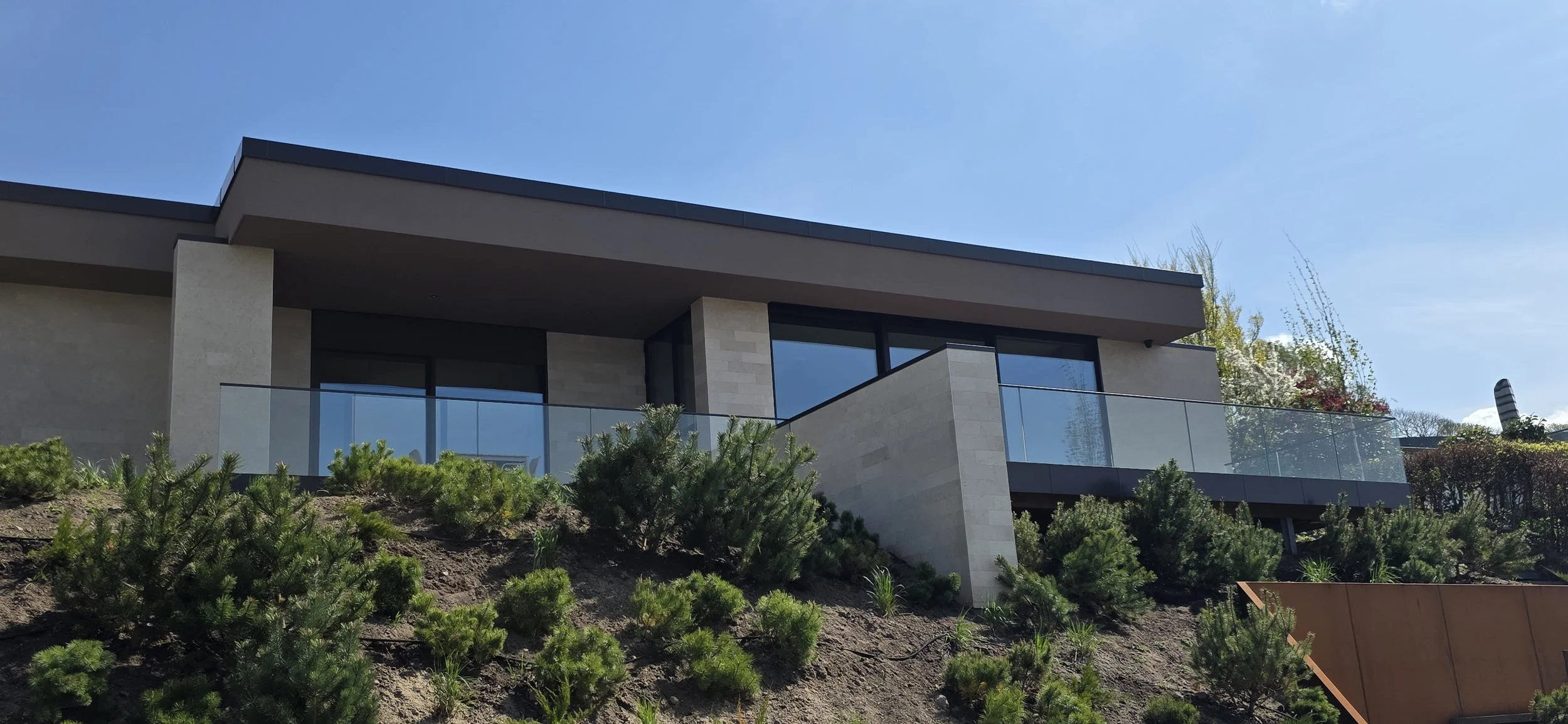 One-story residential house in Viborg, Denmark, designed with Scandinavian architecture, horizontal lines and strong connection to landscape