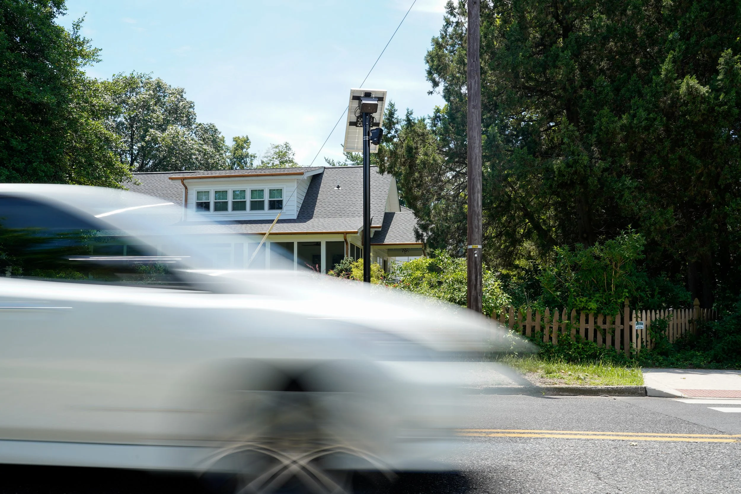 A car passes an Axon license plate reader camera at Cooper River Park in Collingswood, New Jersey on Thursday, June 18, 2026. (NJ.com)