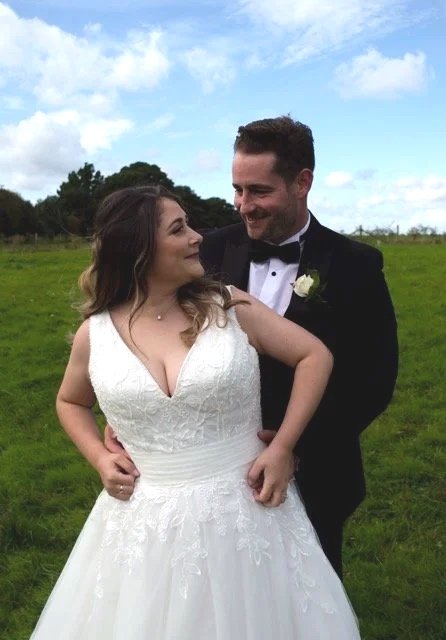 Bride and groom photo after church ceremony at Sarratt Church