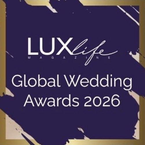 Lux Life Magazine's Global Wedding Awards 2026 event logo with purple and gold design elements.