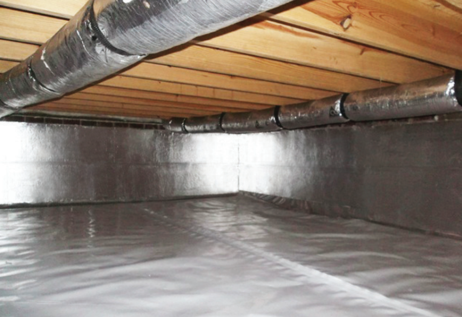 Insulated attic space showing wooden ceiling joists and metal HVAC ductwork.