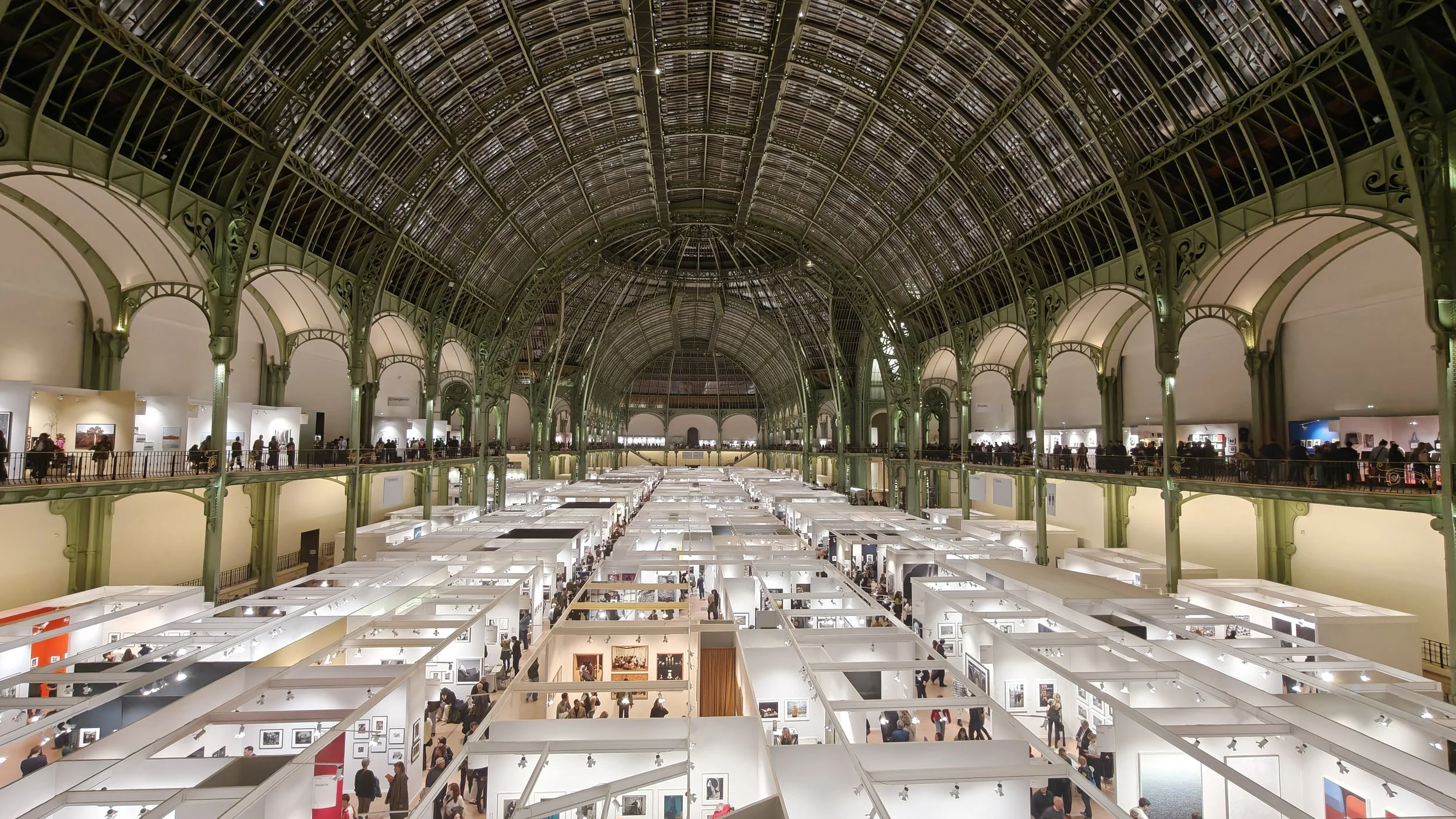 Photograph of photographers exhibiting at Paris Photo 2025 at The Grand Palais in France