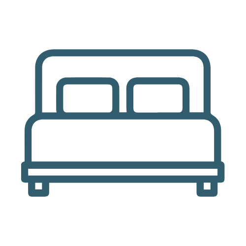 Simple line drawing of a bed with two pillows.