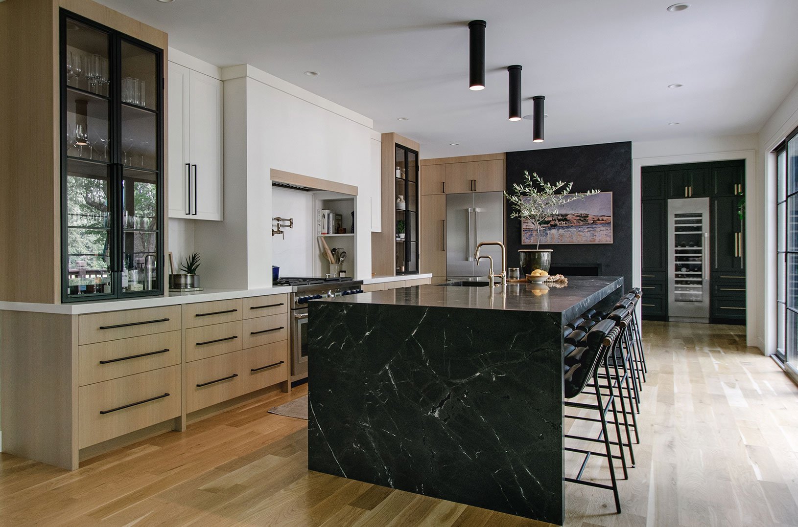 Custom kitchen design in Kansas City with integrated appliances and tailored cabinetry