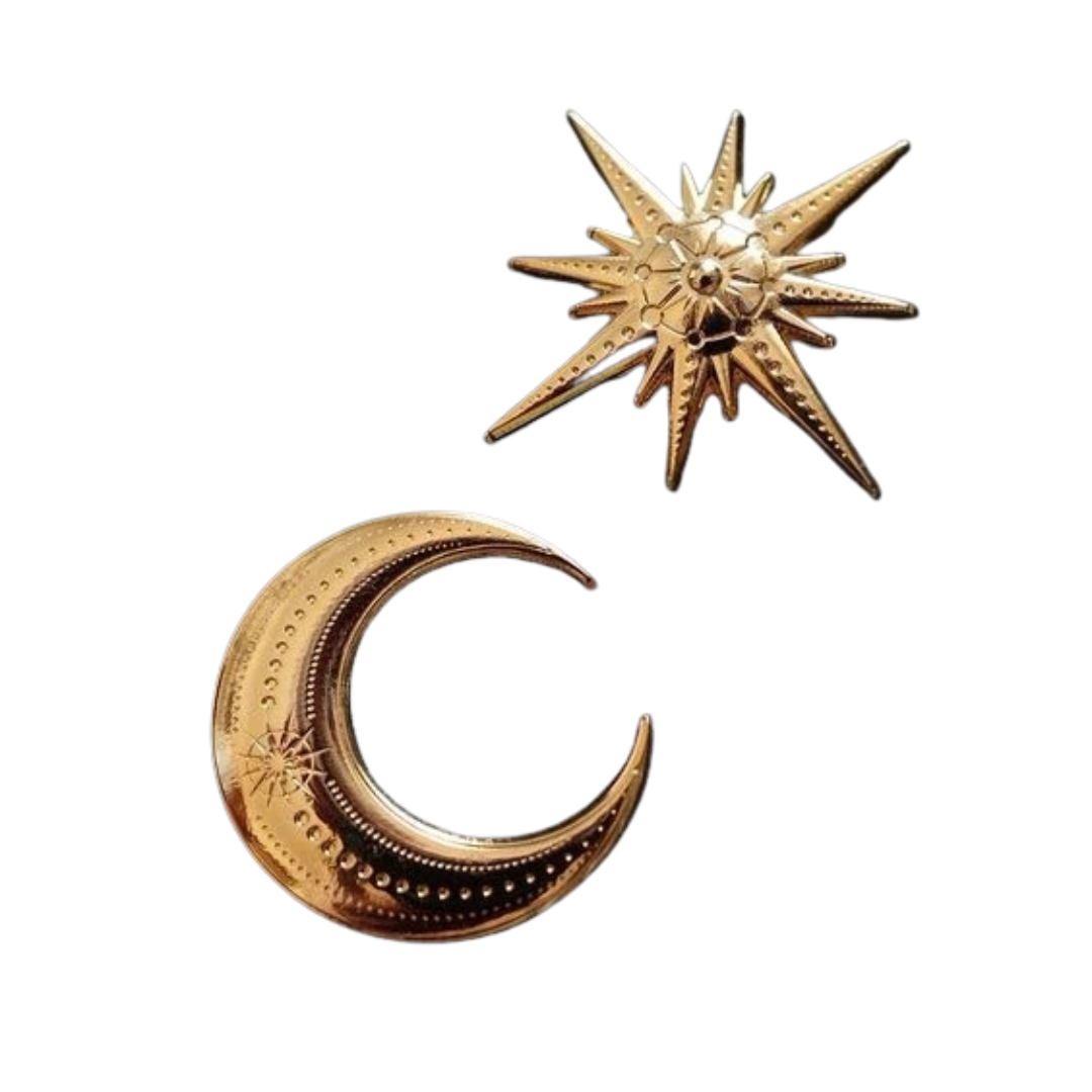 Golden crescent moon and star ornaments on black background.