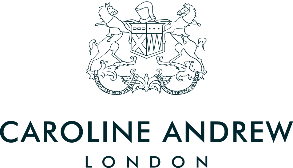 A logo featuring a detailed crest with two heraldic lions supporting a shield, above the text 'Caroline Andrew London'.
