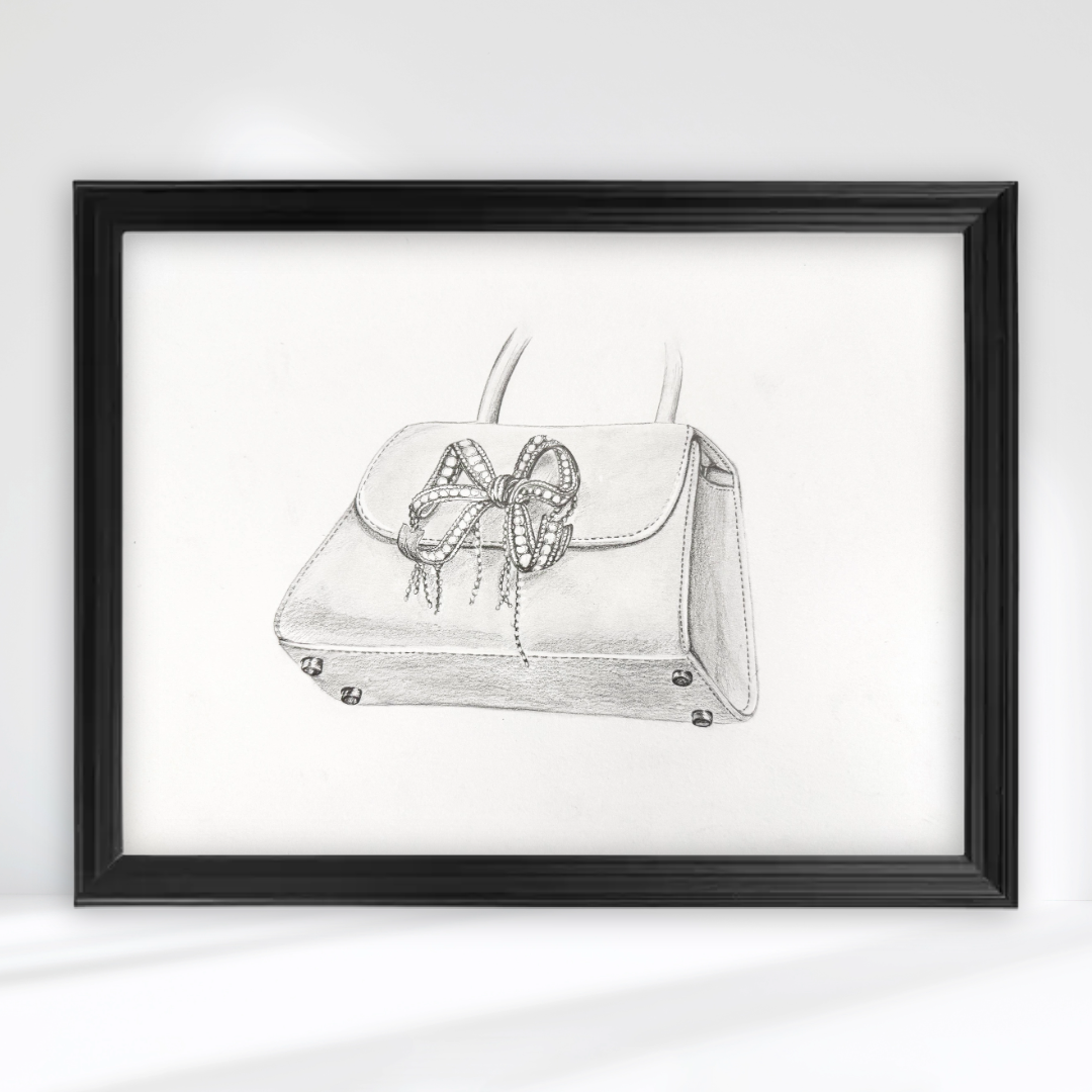 Black framed custom artwork of a Tiffany handbag with a bow of diamonds on the front, drawn with simple pencil lines for a commission project.