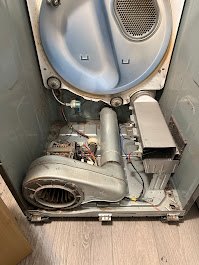 Appliance Repair of an electric dryer that was cleaned after lint build up. Safe appliance for household.
