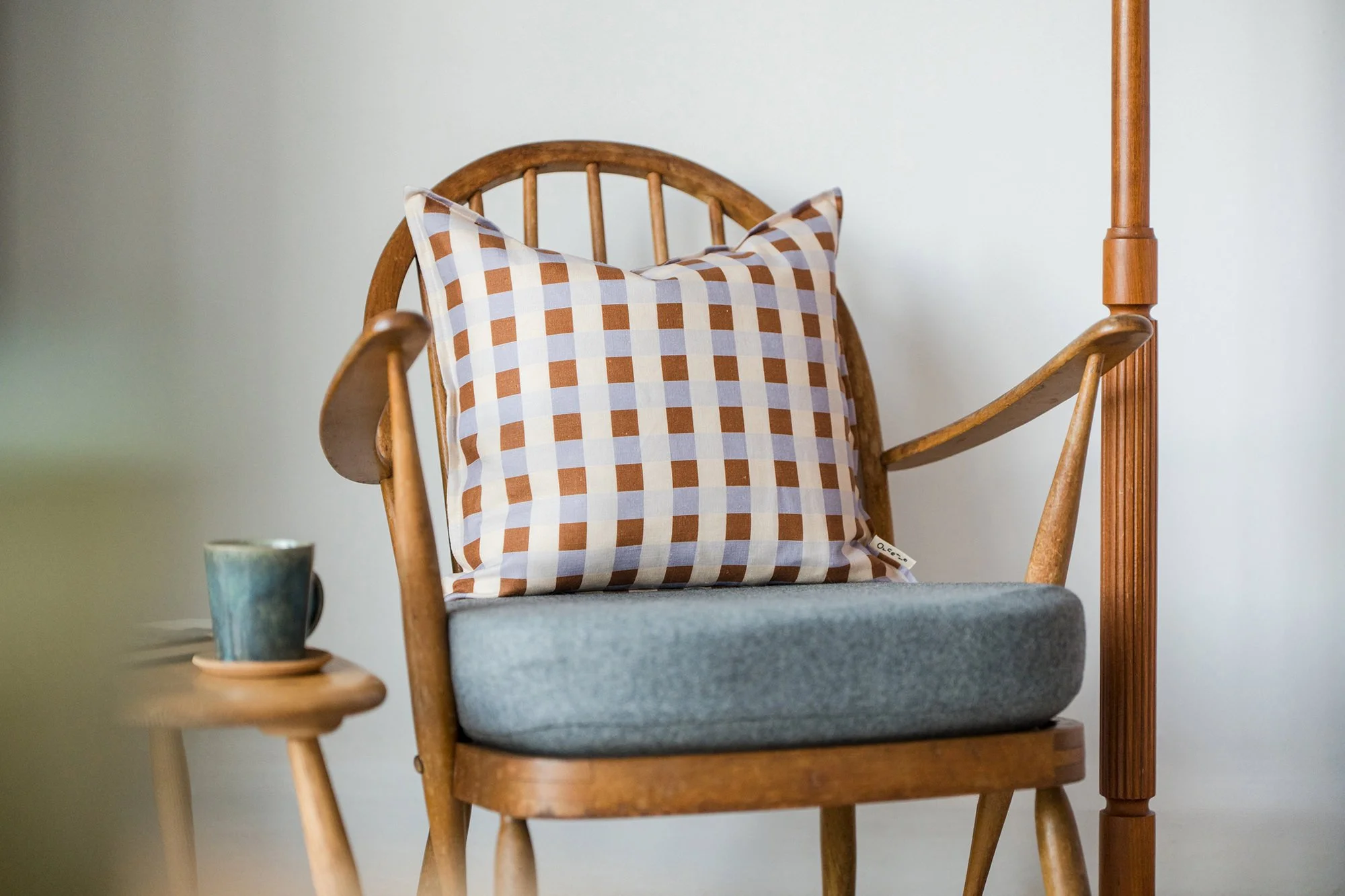 Handmade in England linen gingham cushion with ethical feather inner, zip, linen scatter cushion