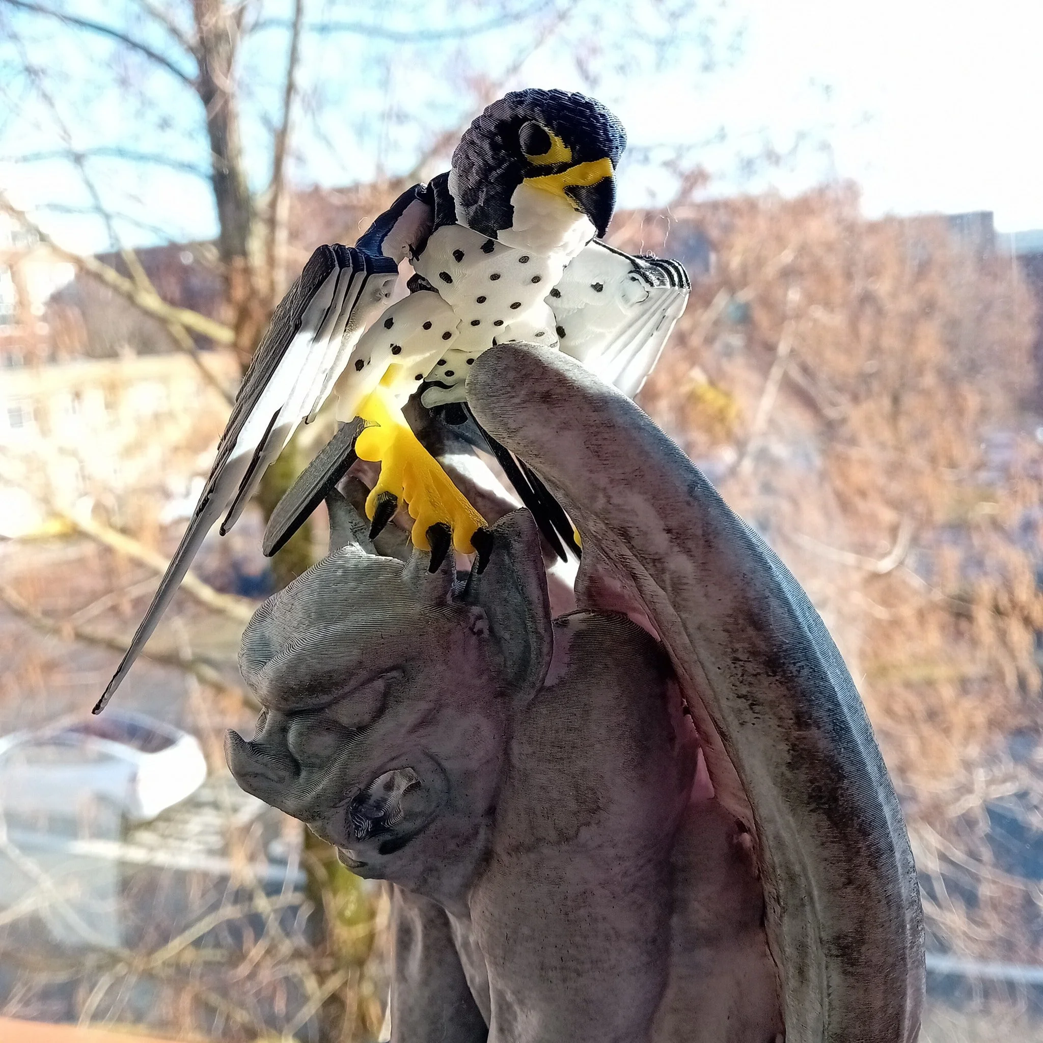 If you sneak in quietly in the morning you might see a Lunar Moth dragon improbably basking in a sunbeam 🌞, a Sheffield peregrine surveying their domain 🦅 🏛, a former parrot admiring themselves in jewellery 💎🪞 and a Cobra lurking in a box after 