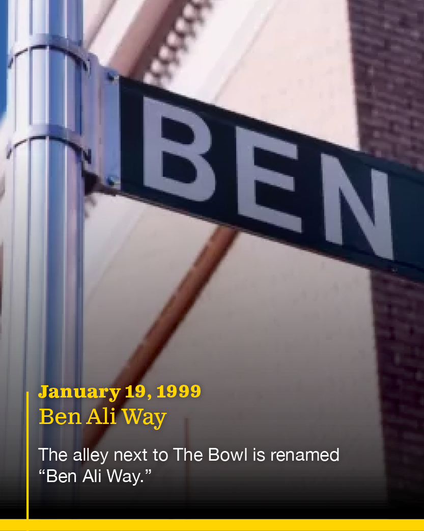 Street sign reading 'BEN' with an overlay text indicating the date January 19, 1999, and that the alley next to The Bowl is renamed 'Ben Ali Way.'