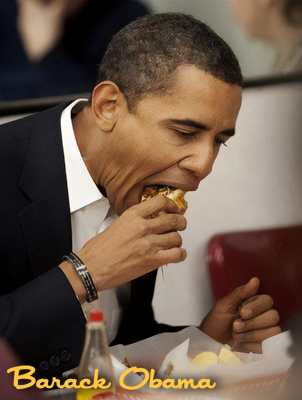 Barack Obama eating a burger at a table.