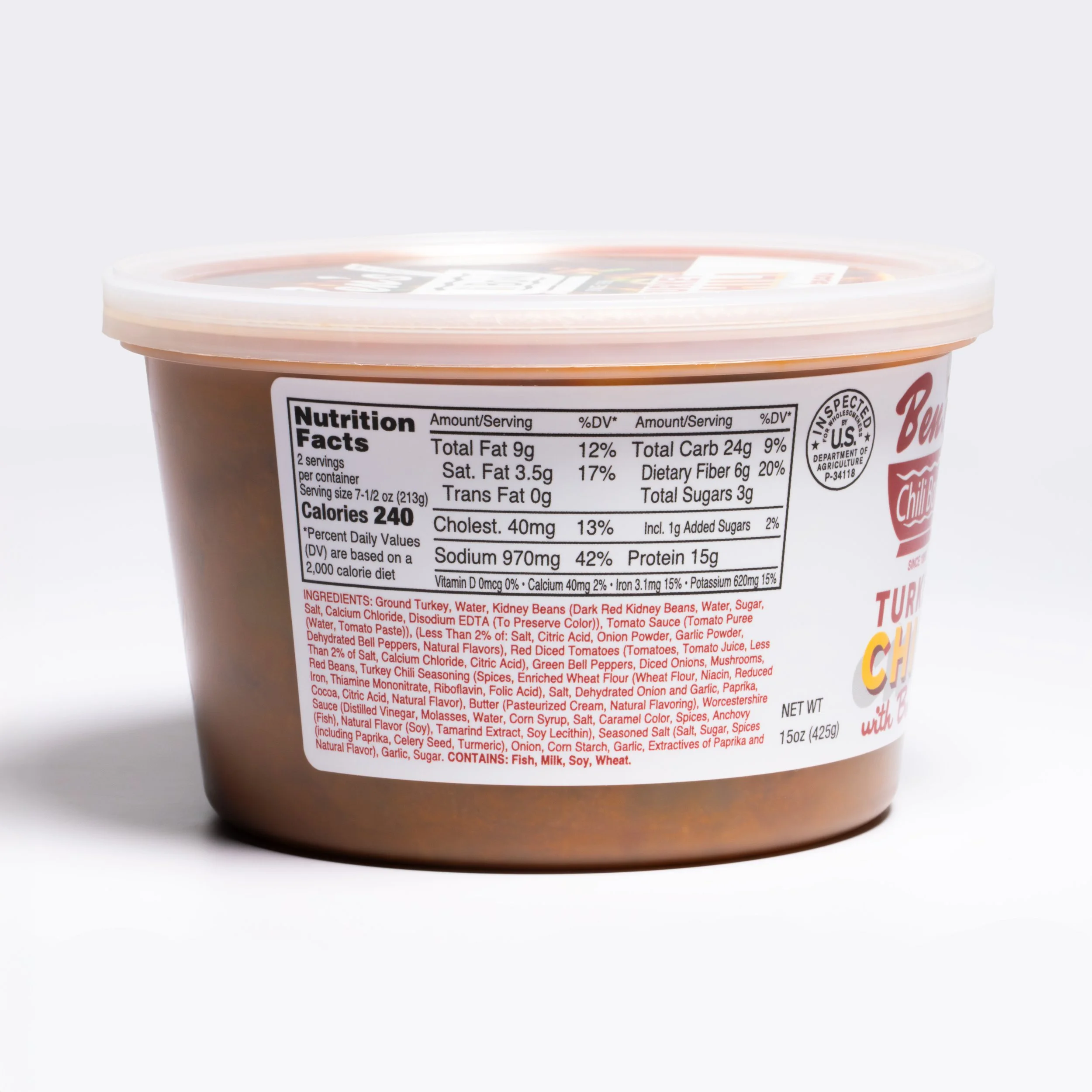 A container of turkey chili with a label showing nutrition facts and ingredients, with a white background.