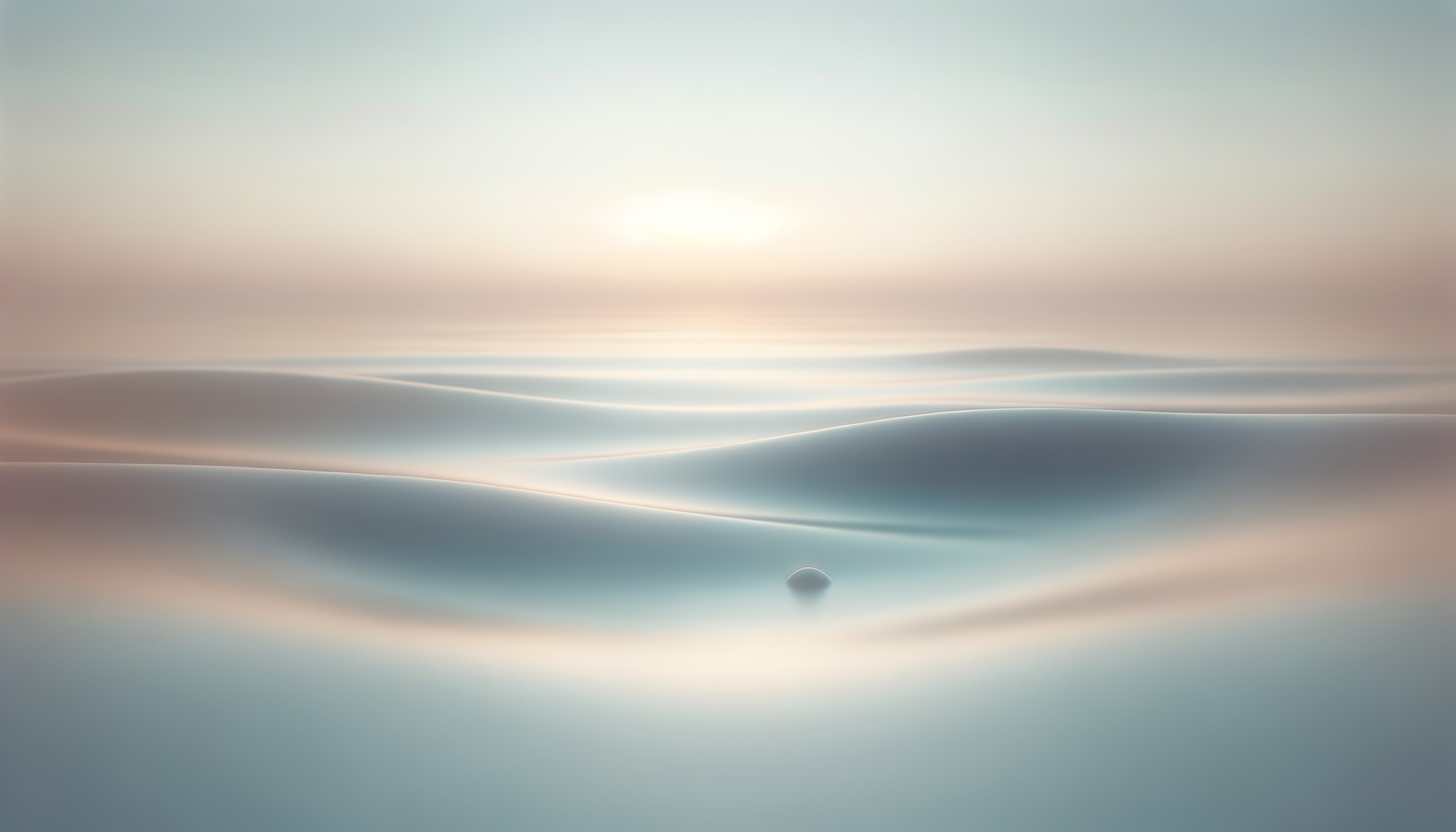 Close-up of ripples and a small droplet on a smooth surface, with soft pastel colors and blurred background.