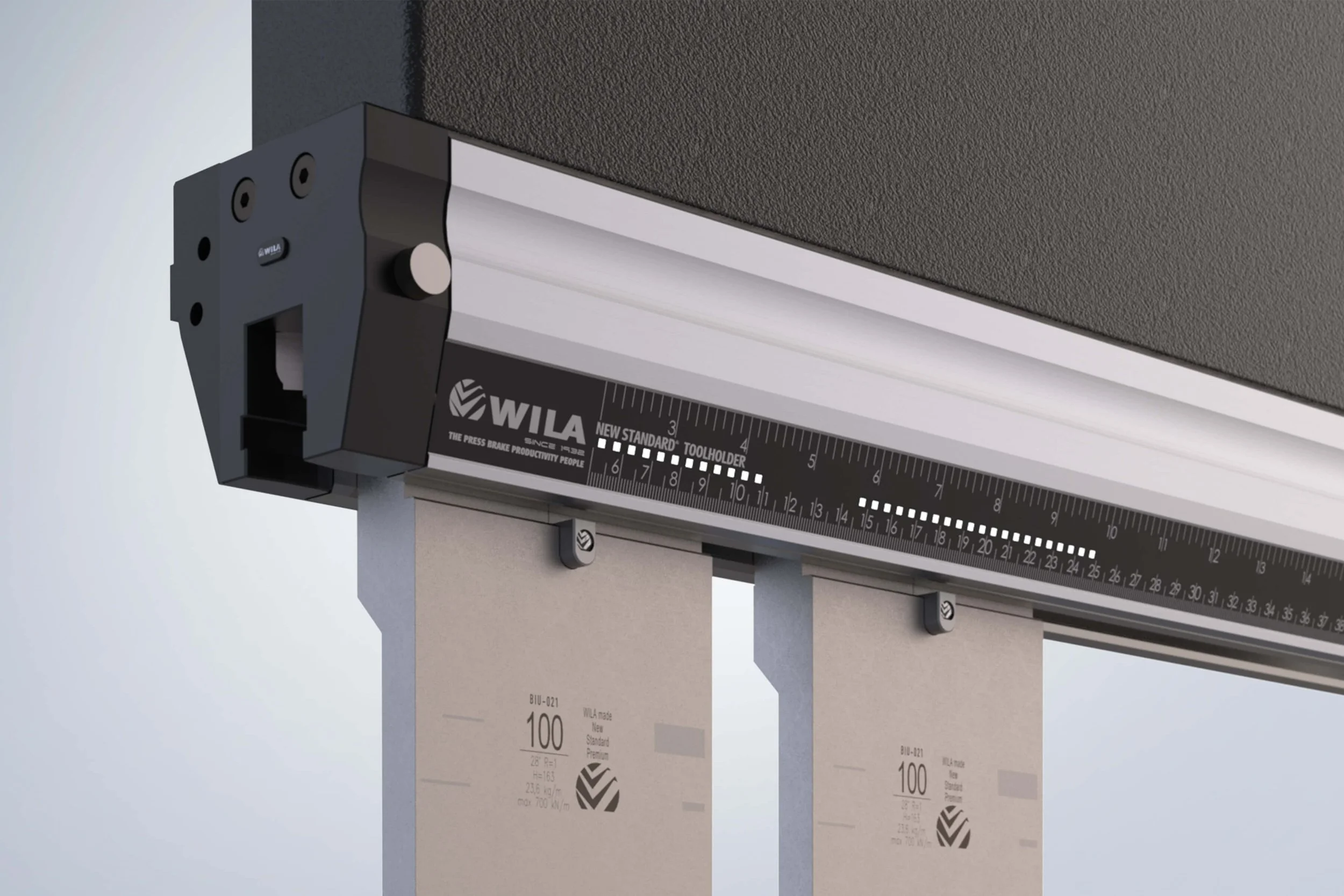 Una herramienta de medición de precisión con la marca WILA y una regla en pulgadas y centímetros, instalada en un sistema de montaje para tarjetas o placas.