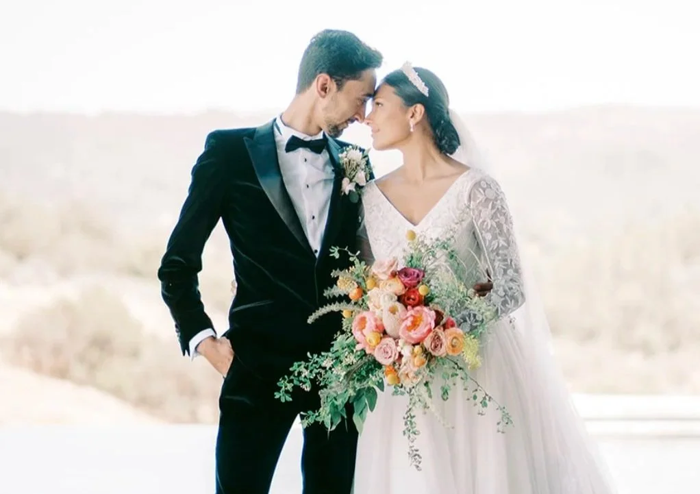 The Blonde Bouquet Floral Design - Northern California. Florist for Napa, Lake Tahoe, San Francisco, Sonoma weddings. Elegant, colorful, organic, whimsical, cascading bouquet with banksia, peonies, ranunculus, billy balls, seeded eucalyptus