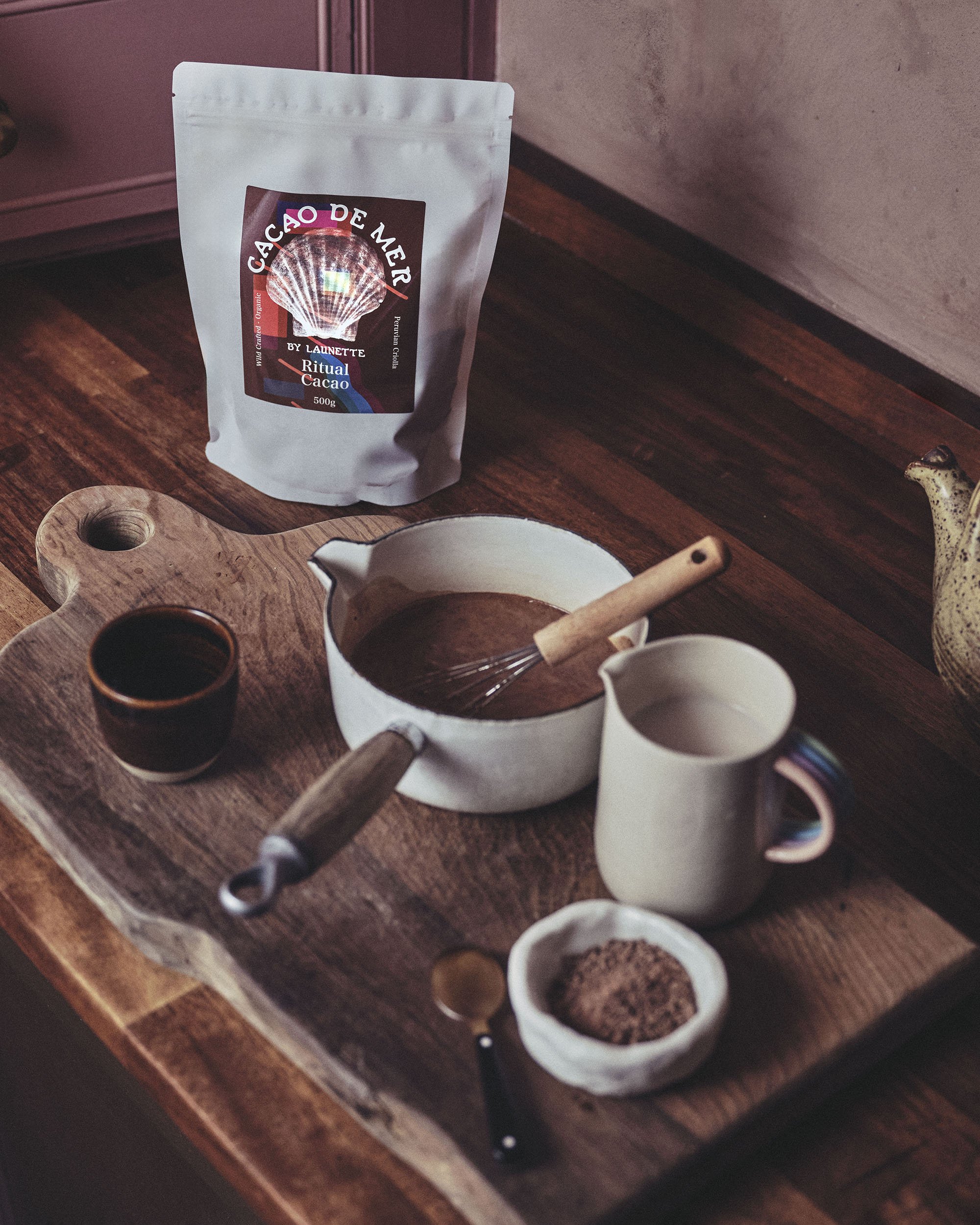 Close up of preparing morning cacao in bespoke ritual ceramic cup