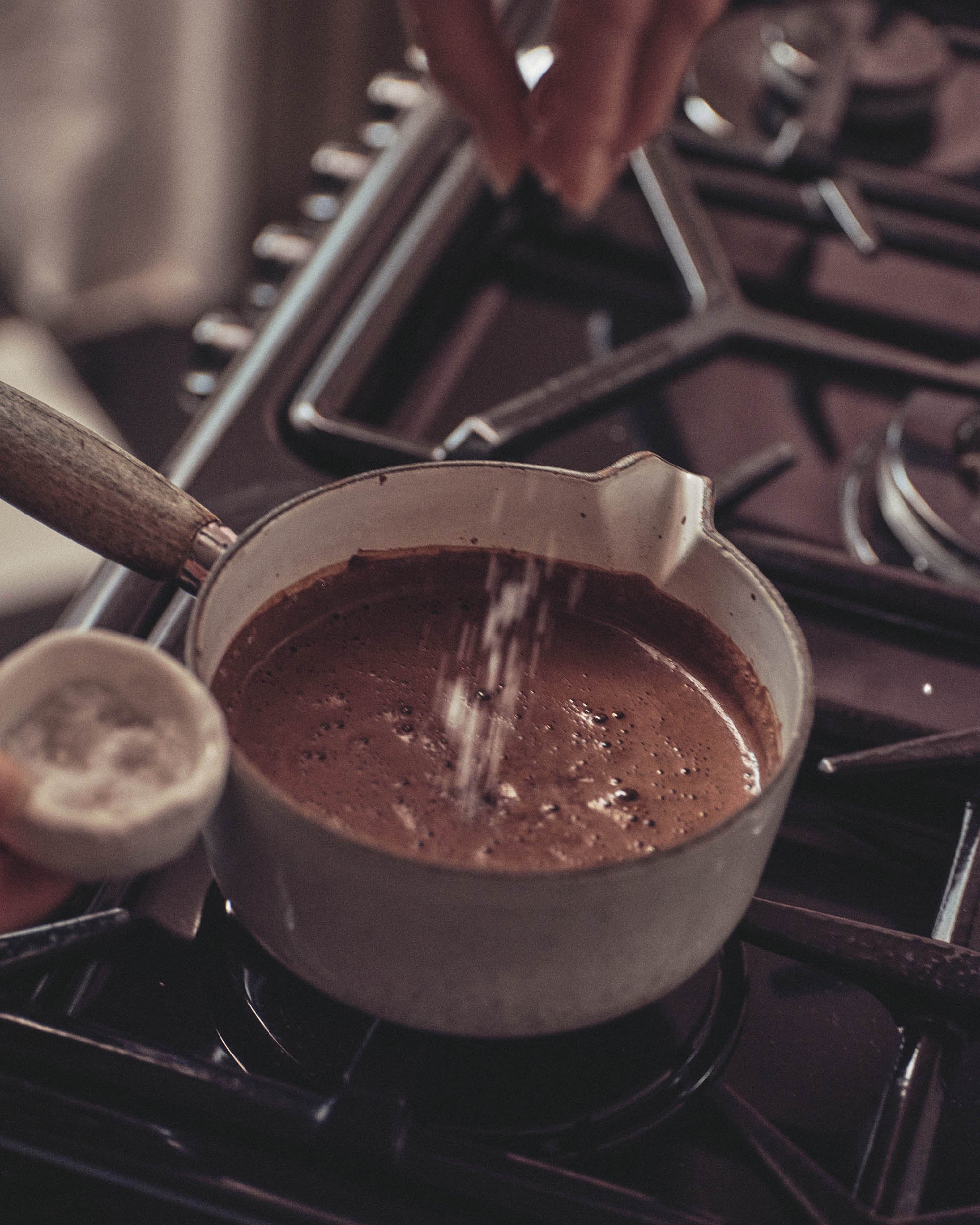 Adding Sea Salt to Stone-ground ritual cacao block made from Peruvian Criollo beans