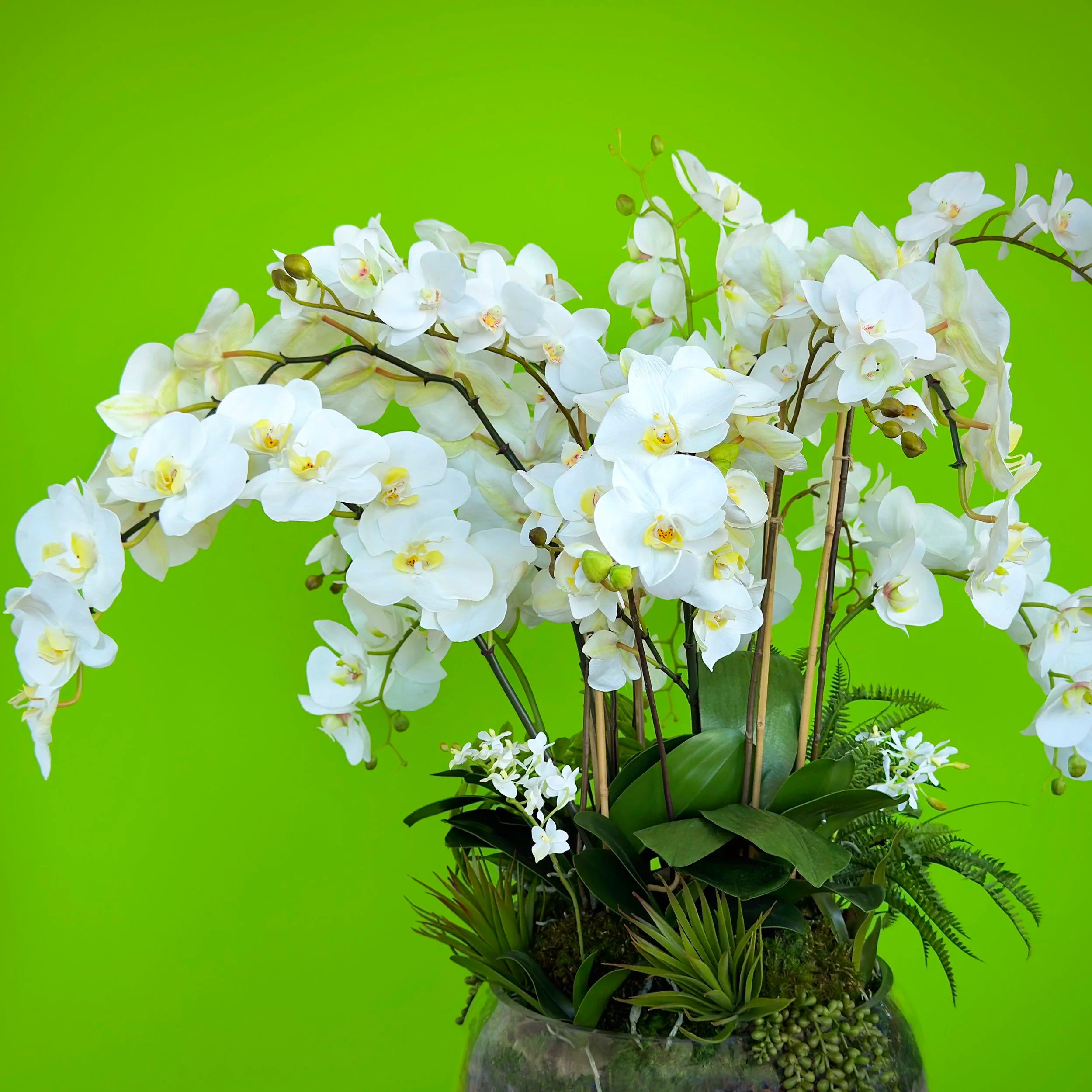 Beautiful white orchid faux botanical centerpiece