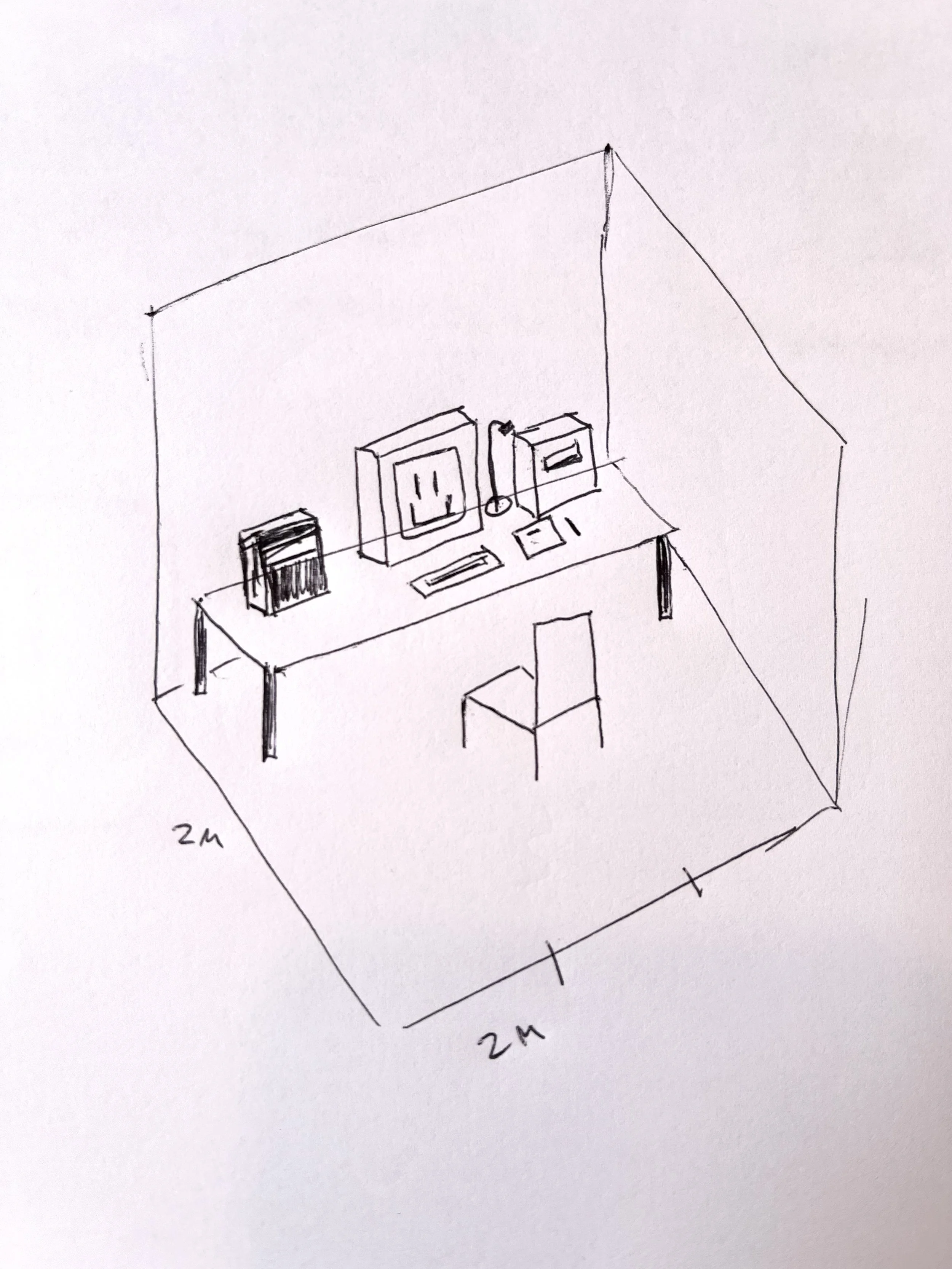 A hand drawn image of a room with a desk, computer, chair and some boxes. The computer has a smiling face.