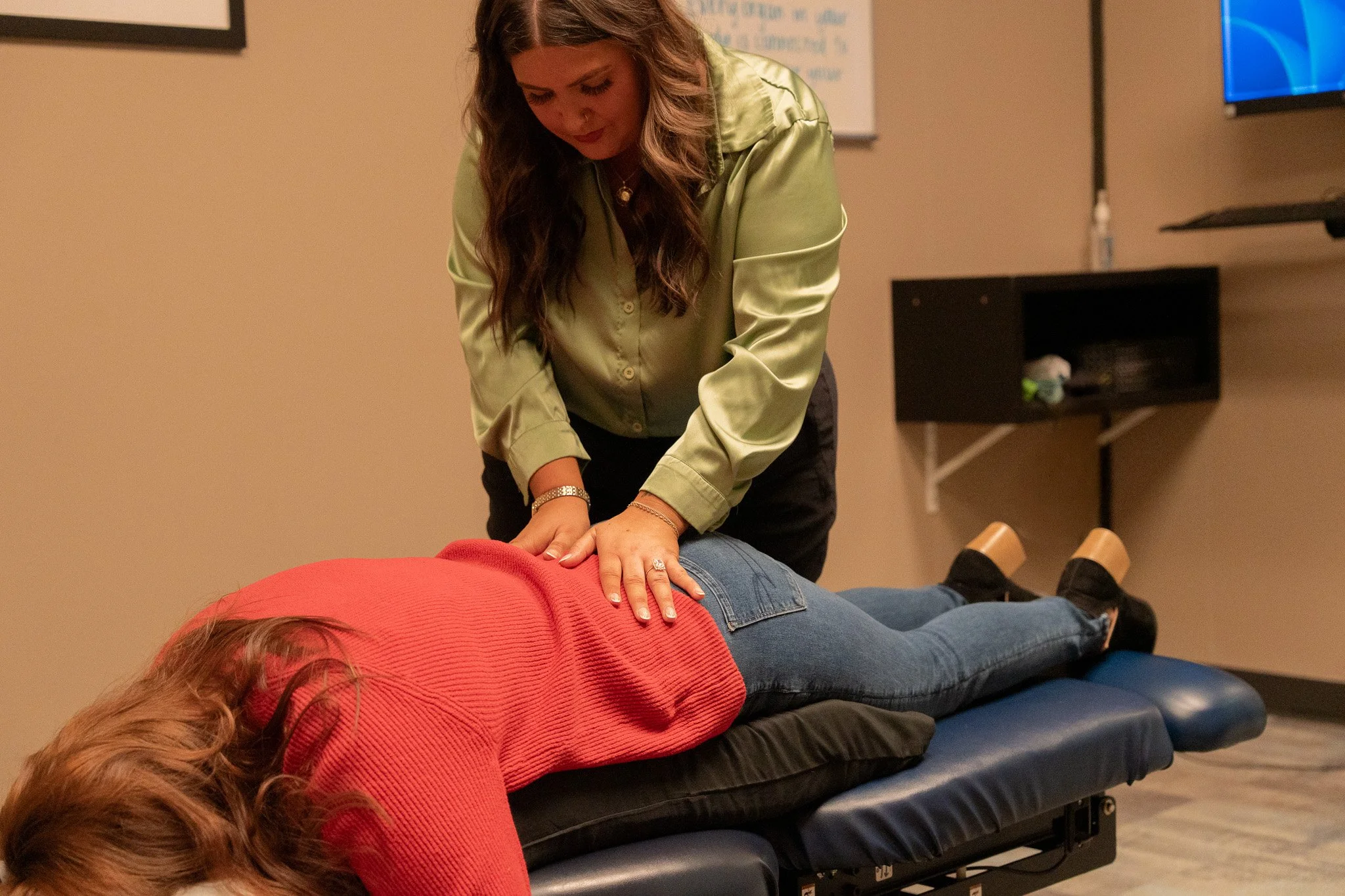 Dr. Sophia Duarte providing prenatal chiropractic care to a patient at Radiant Chiropractic in West Ashley, Charleston SC