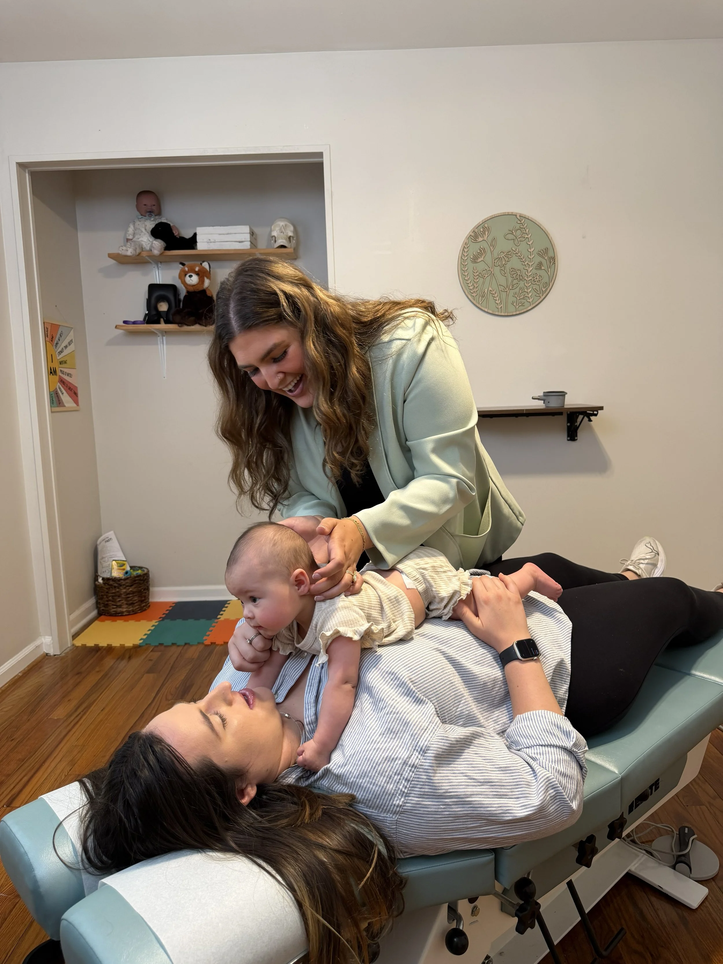 Dr. Sophia Duarte performing a gentle chiropractic adjustment on an infant at Radiant Chiropractic in West Ashley, Charleston SC