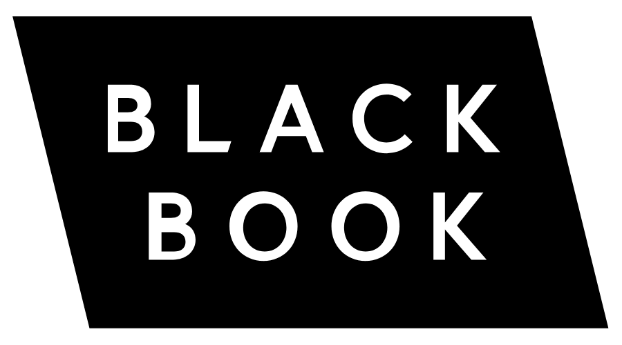 Black book cover with white text that reads 'BLACK BOOK' in bold, capital letters.