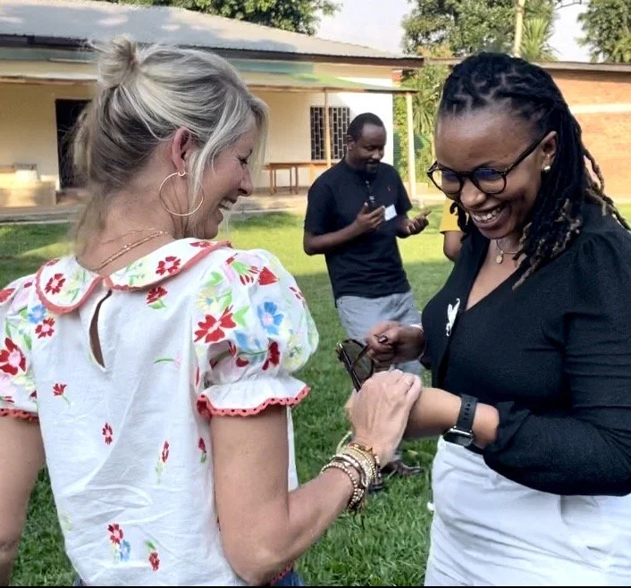 Allie dancing with Dr. Clemence Idukunda, Roots&Shoots Rwanda National Coordinator, at the conclusion of our first Evergreen training in Musanze.