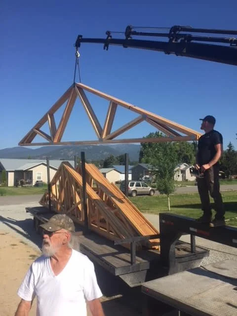 Families in the program contribute “sweat equity” by helping build their own homes alongside volunteers. This hands-on involvement builds pride, connection, and investment in the Sandpoint community.
