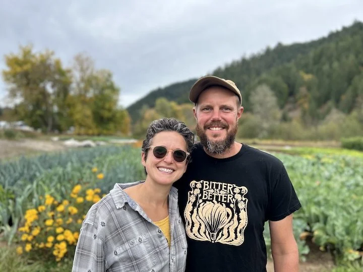 farmers outside smiling