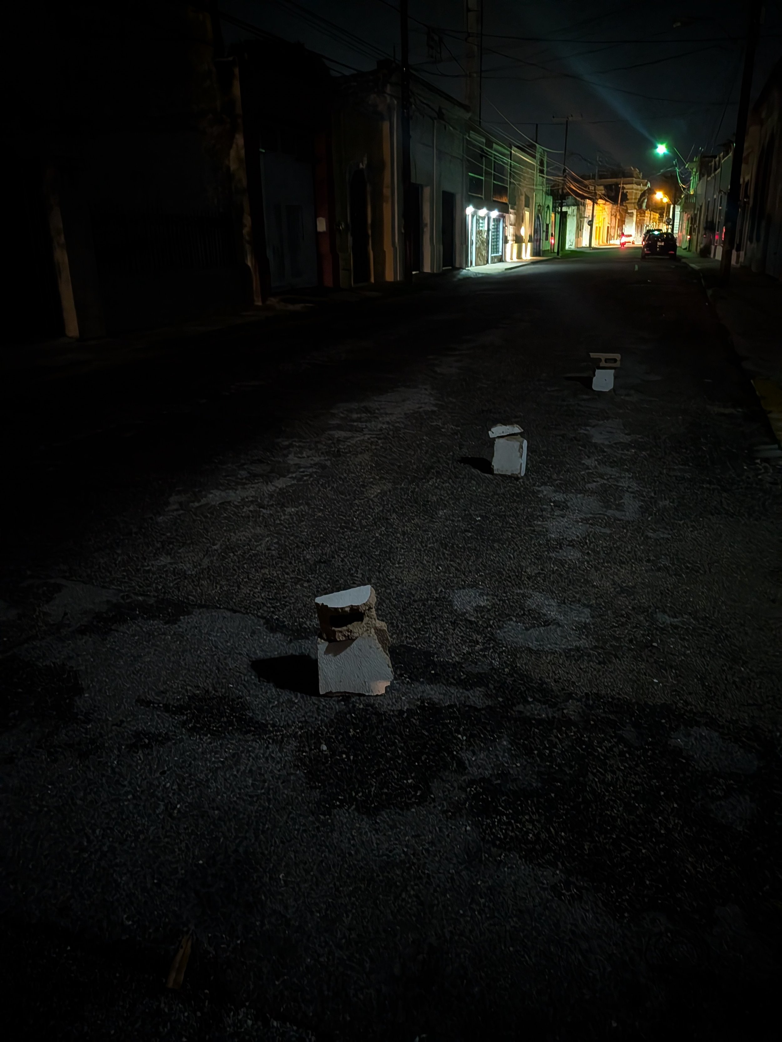CUBETISMO—

Who owns the curb? This project follows the buckets, cones, chairs, and other objects people use to claim public parking spaces in Mérida to explore how everyday negotiations over public space reveal the gap between formal rules and how c
