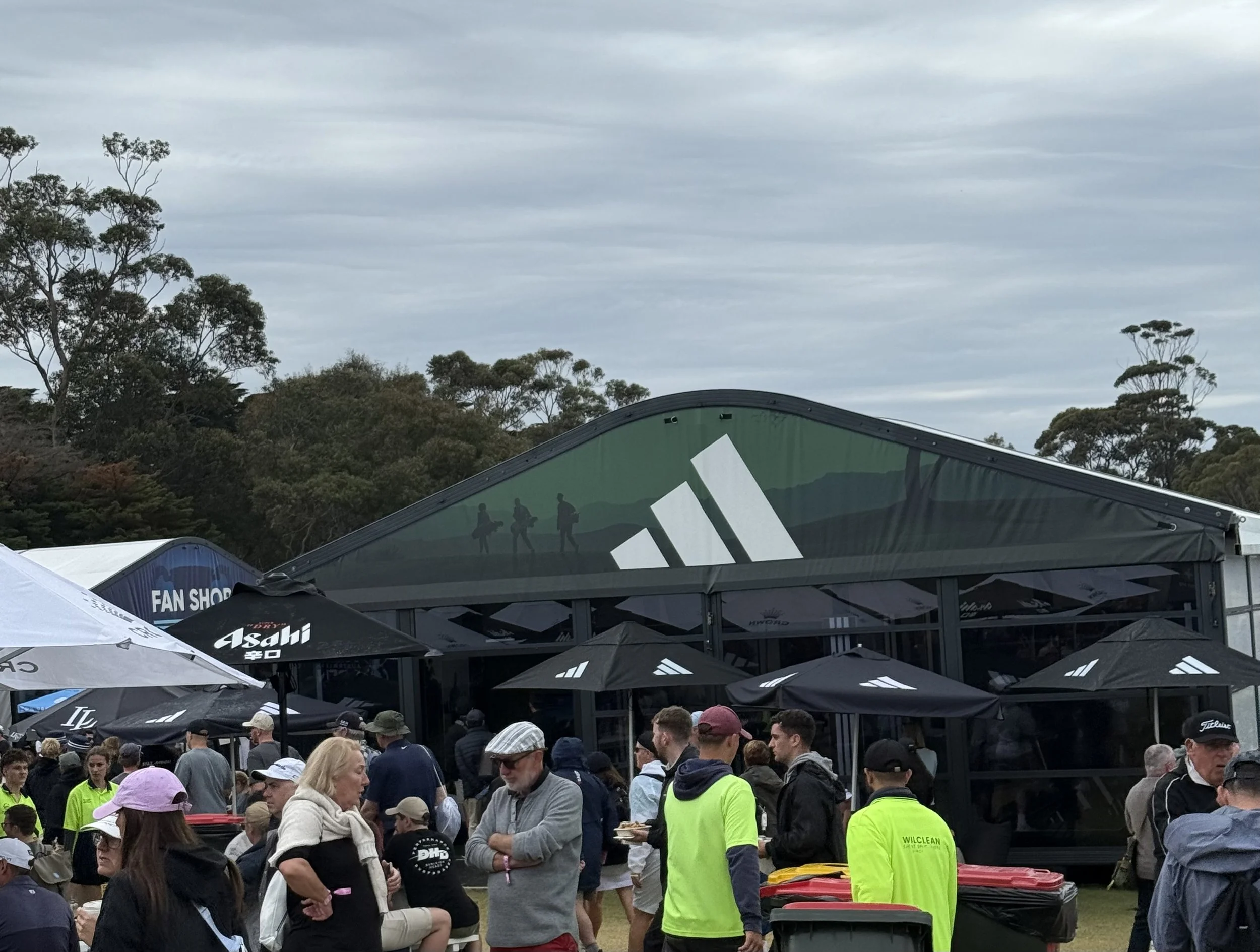 Adidas activation space at The 19th, showcasing the iconic three stripes without a wordmark.