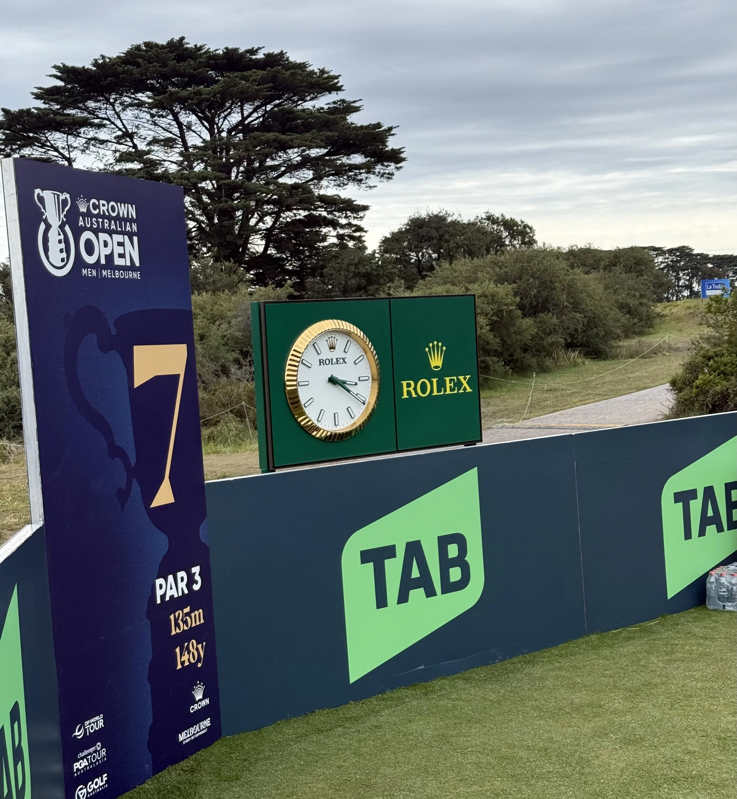 Rolex clock at the picturesque 7th hole, reinforcing the brand’s prestige and timeless presence in elite sport.