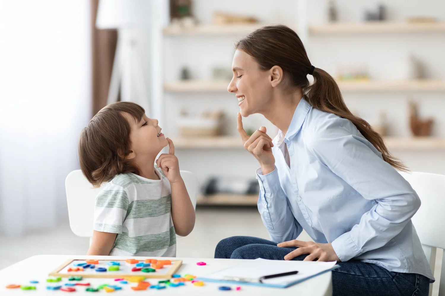 Parent sharing a supportive moment with an autistic child