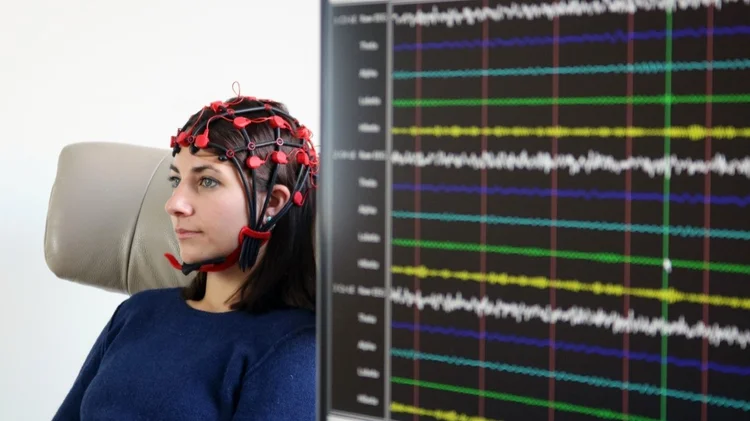 An adult participating in neurofeedback