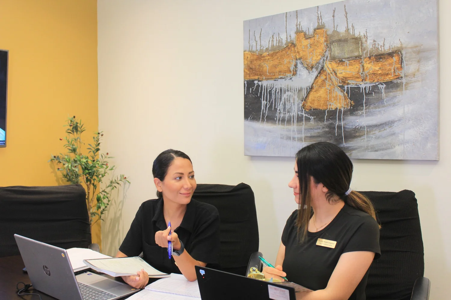 Touch Brain Counselor team members collaborating in the clinic