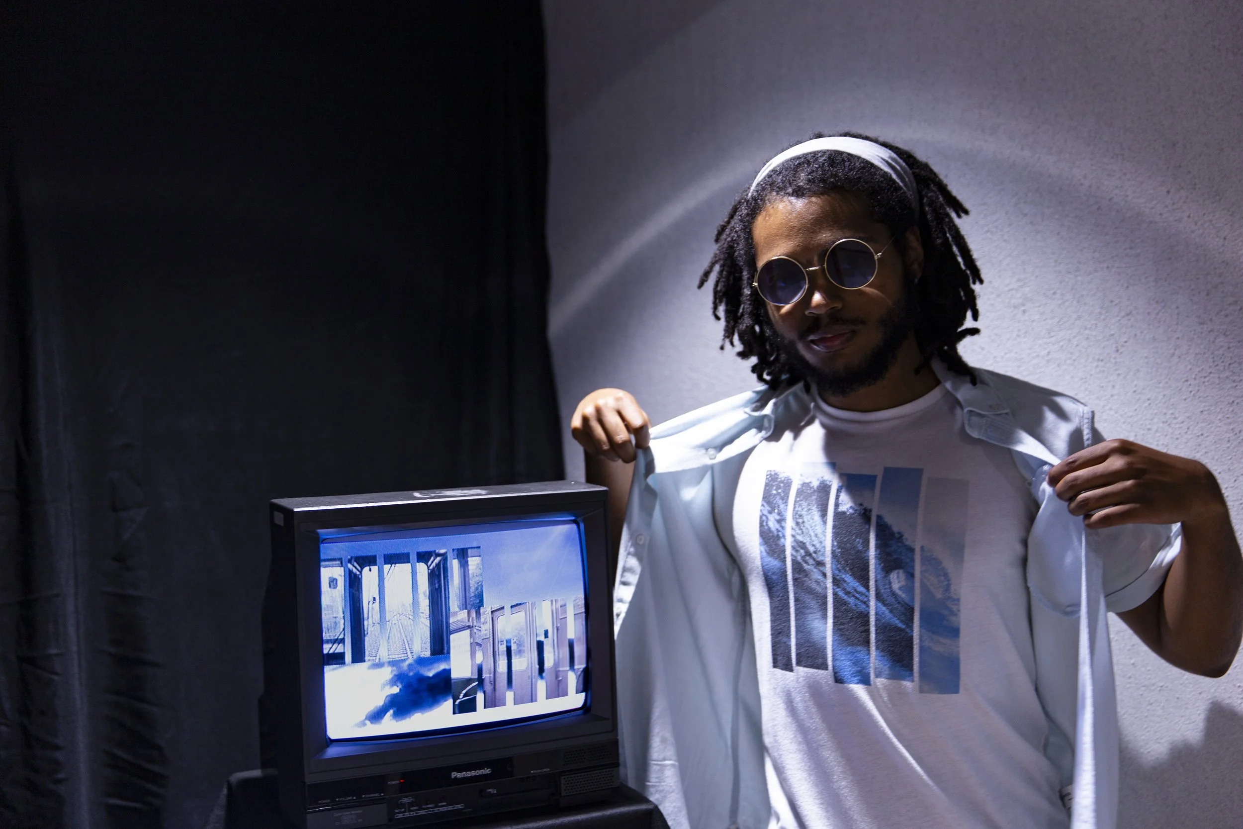 Sterling Smith posing next to Around You/Me