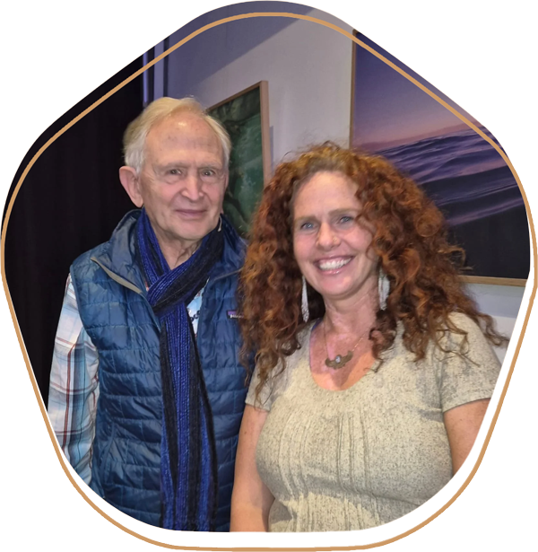 Jaya Hollohan standing beside Dr. Peter Levine