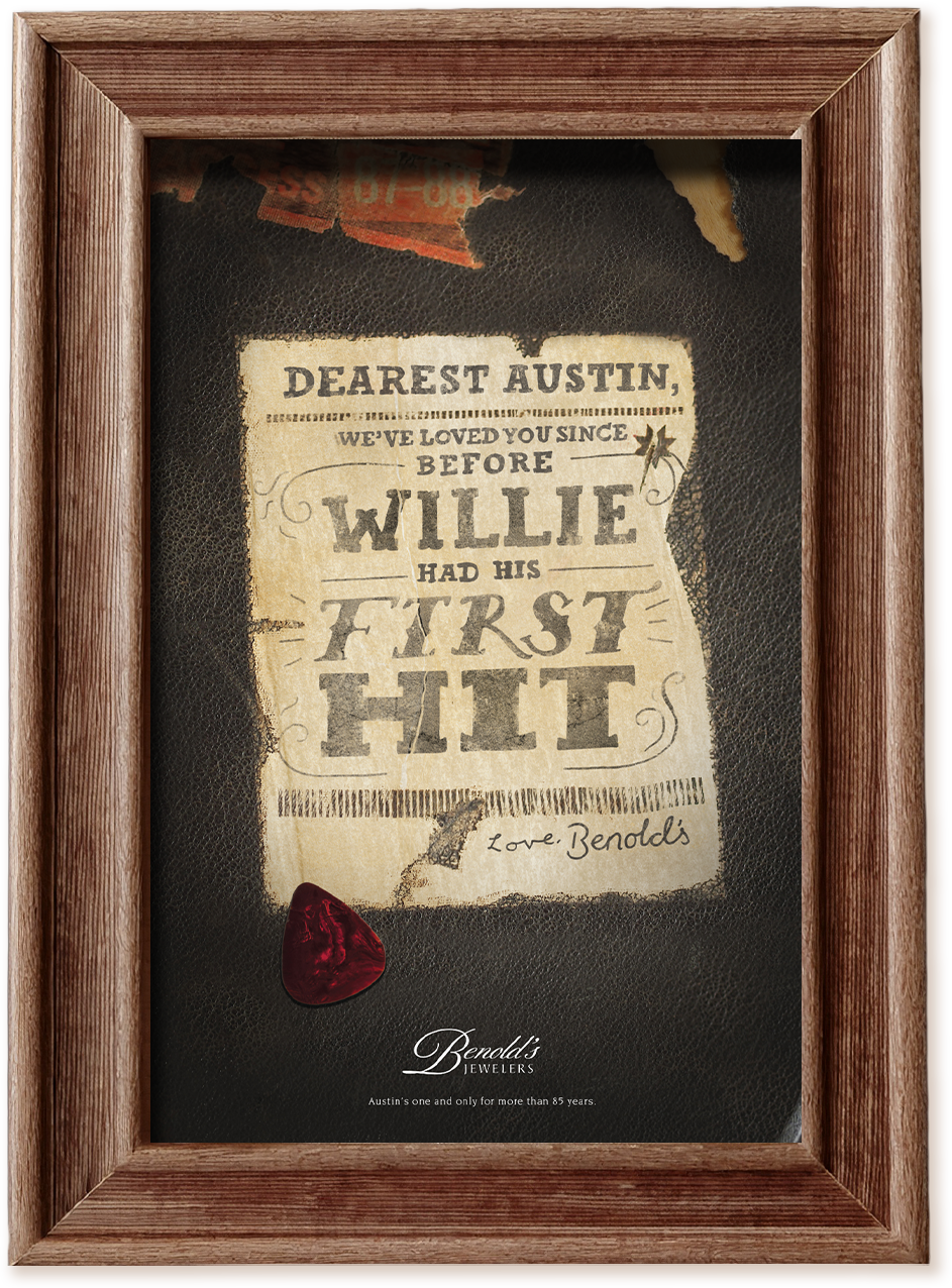 A framed advertisement for Benold's jewelers with a worn out black leather guitarcase with a weathered sticker on it that reads "Dearest Austin, we've loved you since before Willie had his first hit." Also features Benold's logo.