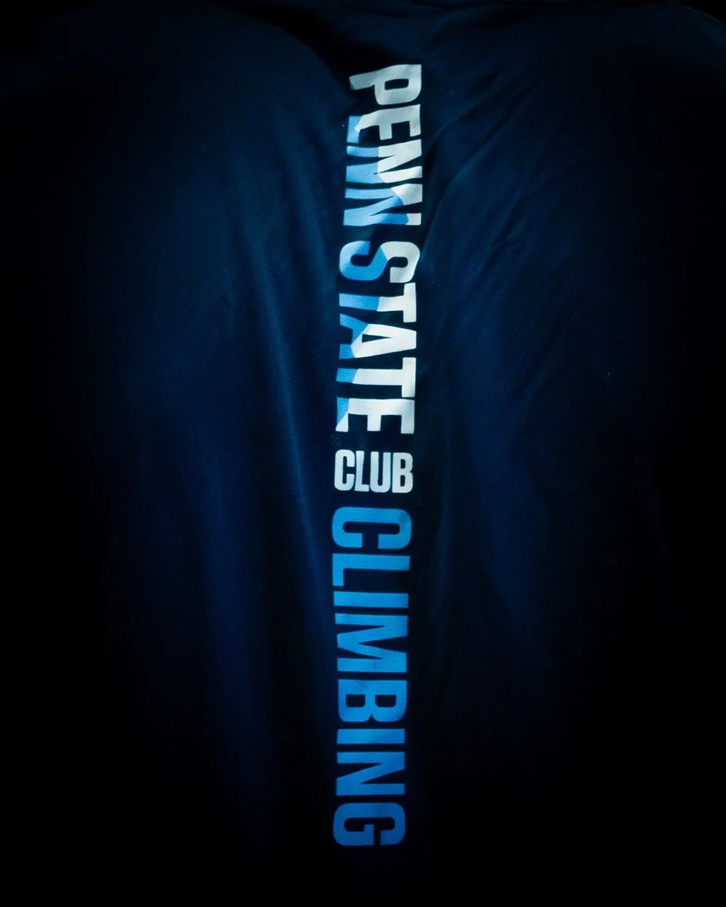 Taken in DC, an intimate picture of the back of a Penn State Climber's uniform which displays the logo in a deep bold style during a sporting event