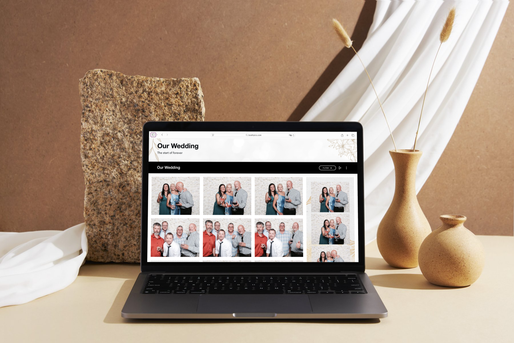 Laptop view of an online wedding photo booth gallery displaying guest photos