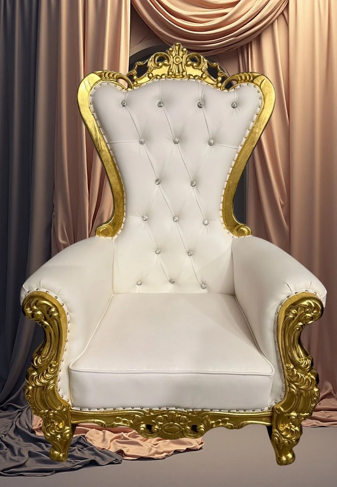 White and gold throne chair rental with elegant draped backdrop for luxury events