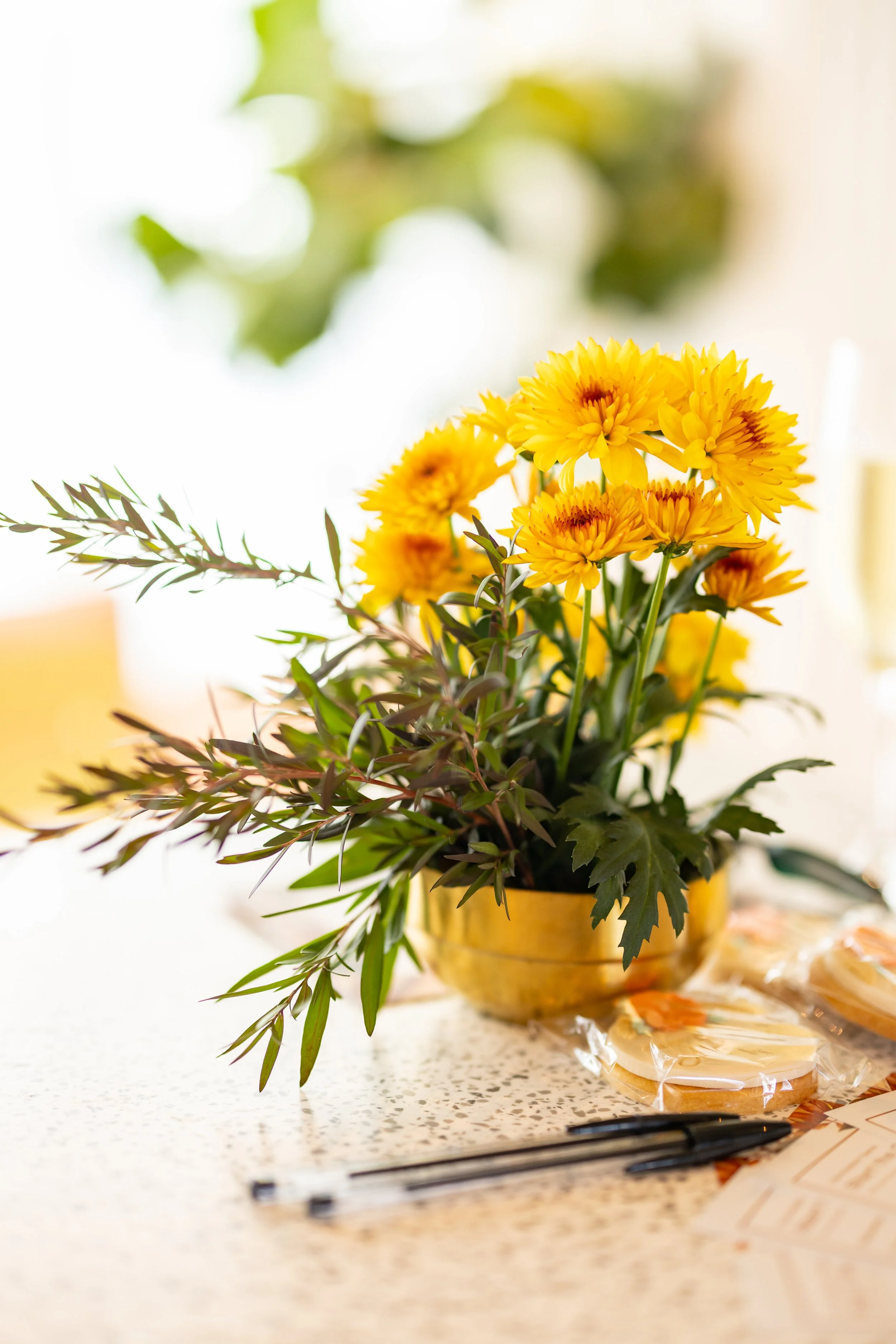 Gold and yellow floral centrepieces