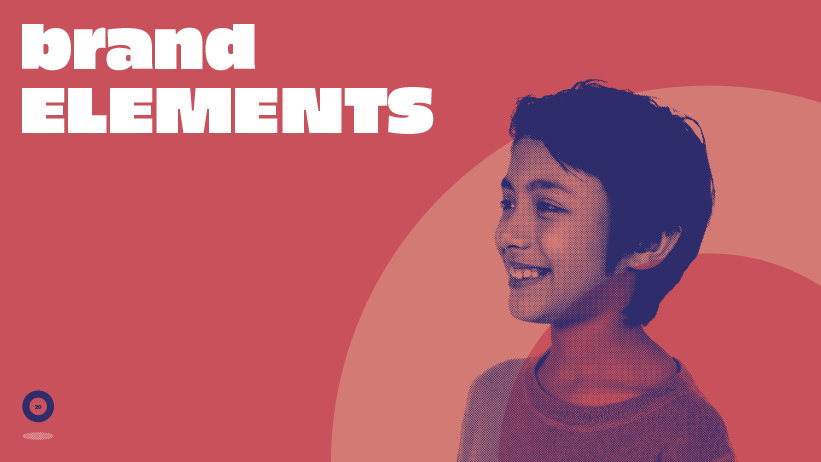 A young boy with short dark hair smiling, with the text 'brand elements' in large white letters on a pink background.