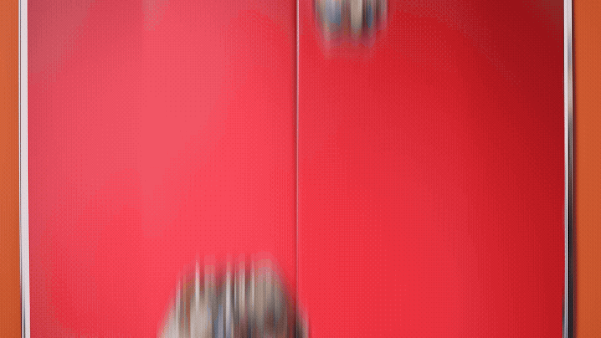 Red surface with metallic edges.