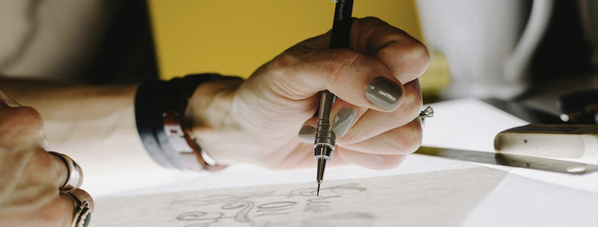 Designer designing bespoke lettering