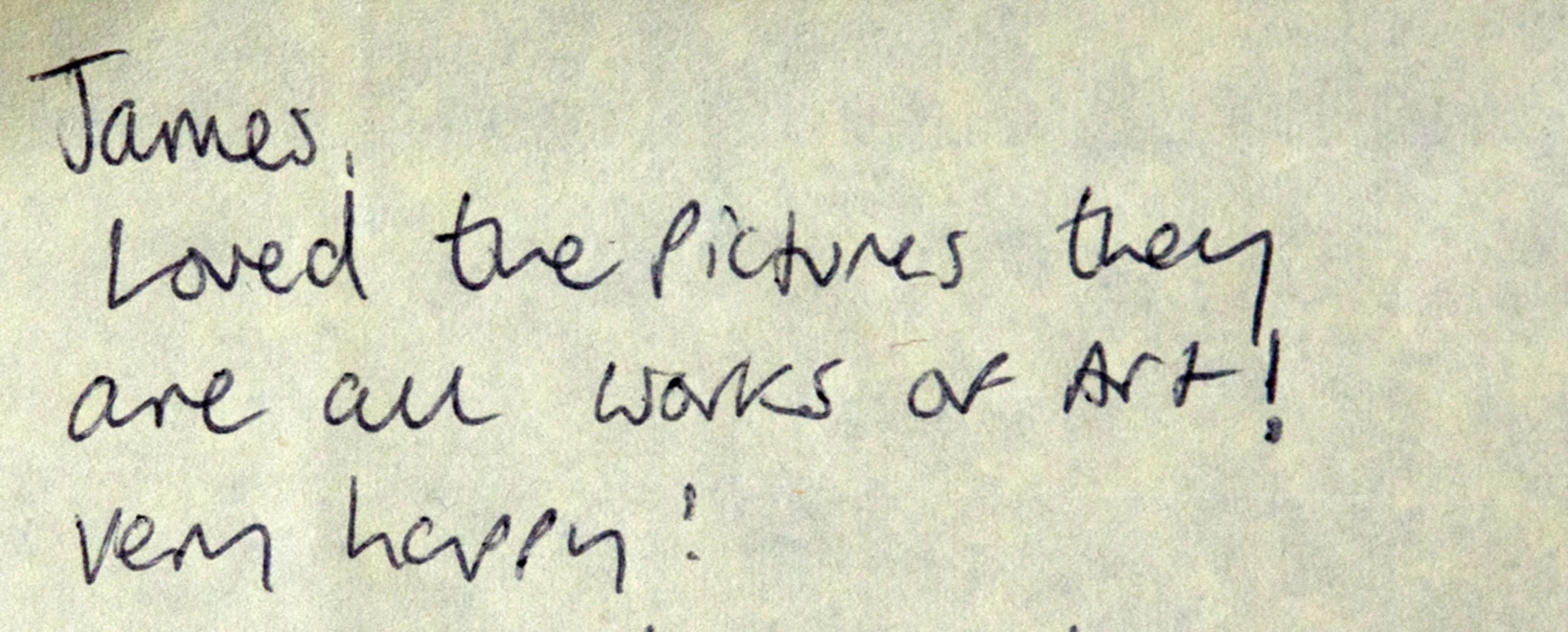 Handwritten note that says, 'James, loved the pictures they are all works of art! very happy!'
