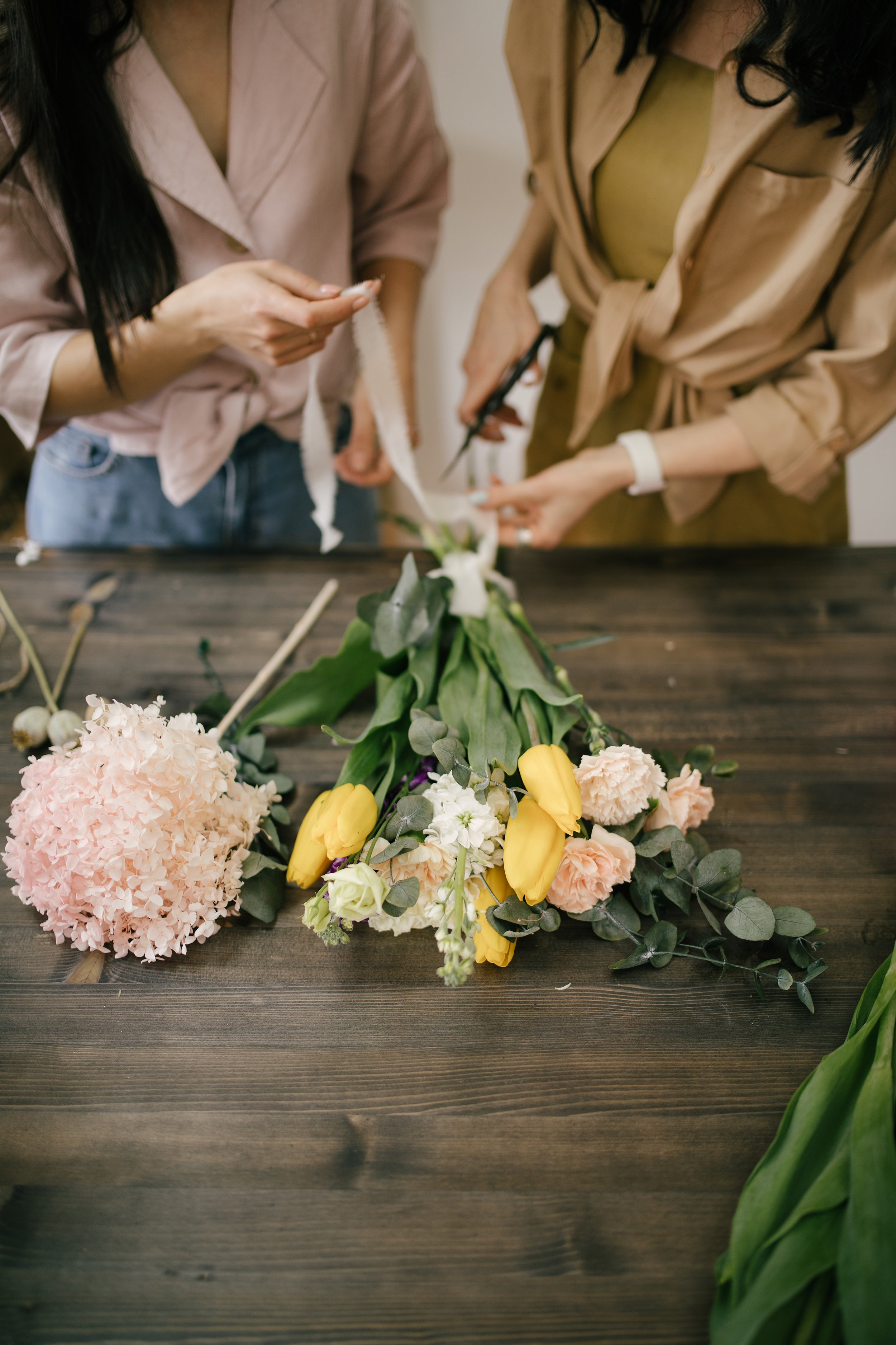 two-women-florists-making-flower-compositions-usin-2026-03-13-01-50-19-utc.jpg